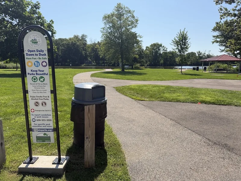 Paved approach from the parking area toward the Fox River